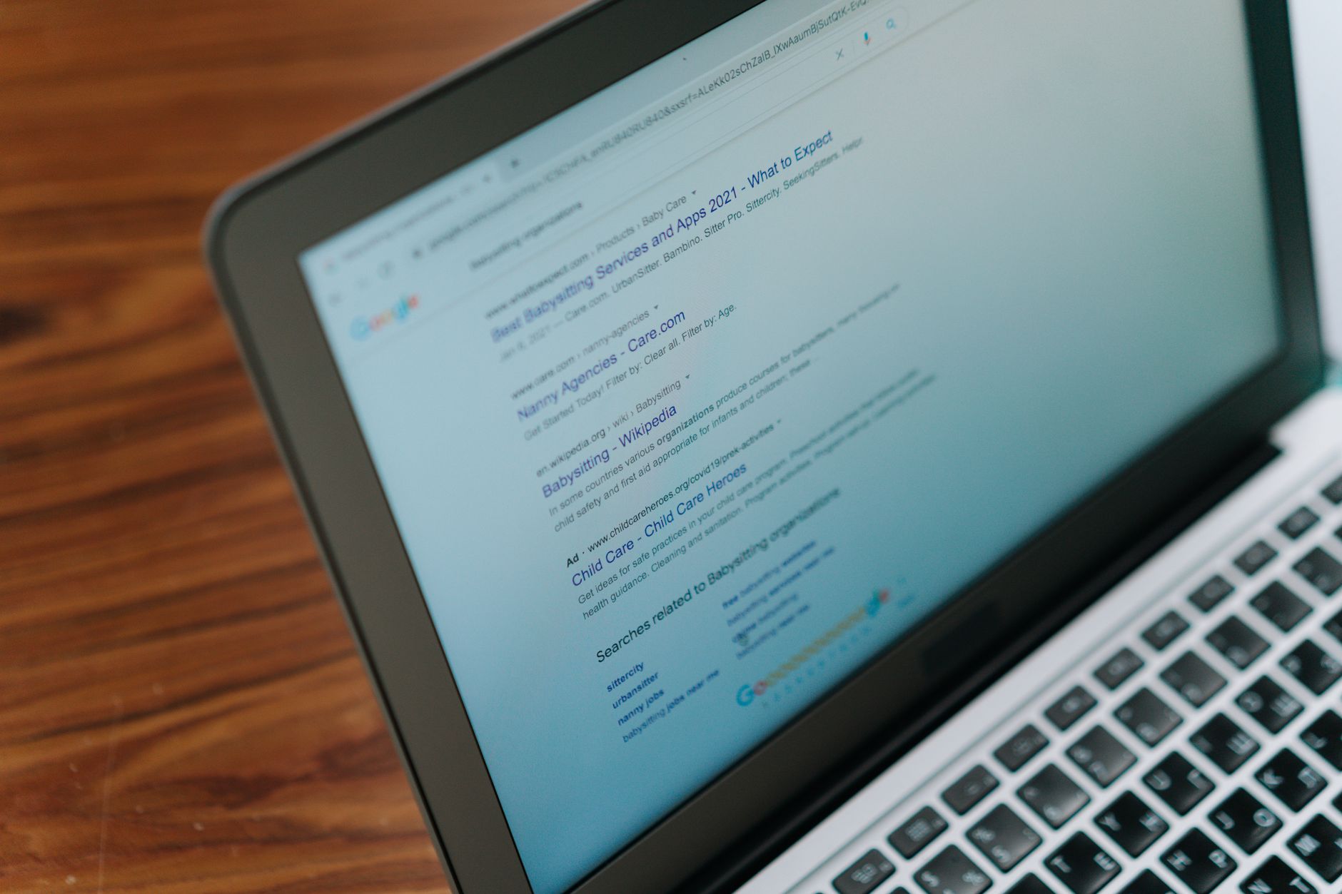 Split screen showing two AI search tools with citation lists side by side