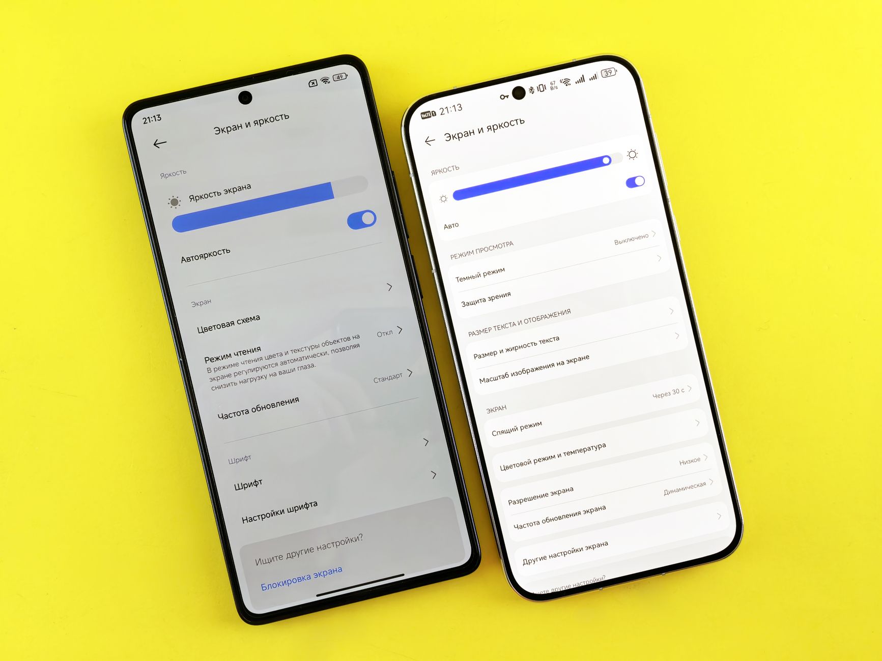 A person comparing two AI subscription apps side by side on a smartphone.